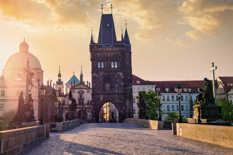 Prague bucket list charles-bridge-tower-in-prague-on-sunrise