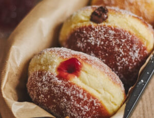 Koblihy is light and fluffy, stuffed with jam or custard, and sprinkled with powdered sugar